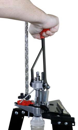 Lee APP 90933 reloading press showing silver frame, red accessories and black base