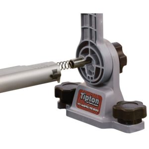 Tipton 1911 mag well vise block shown supporting firearm component
